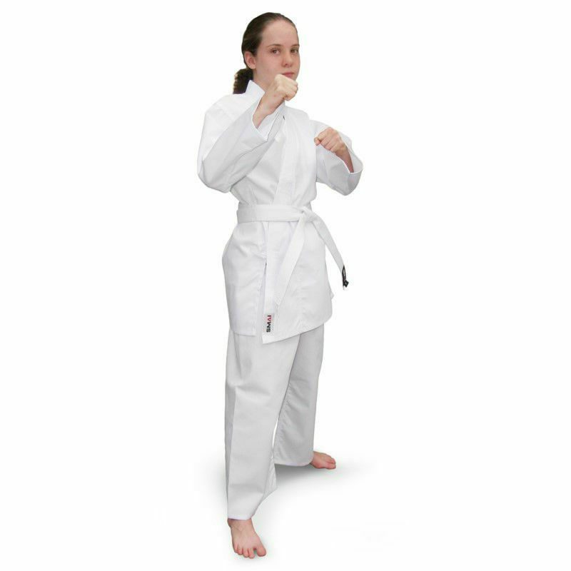 Lady Karate Practitioner in a stance wearing SMAI White Karate Uniform Twill 8oz
